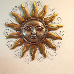 Decorative metal sun for patio enclosure lanai sunroom.